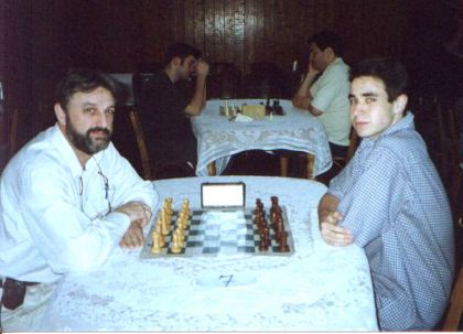 Federao Catarinense de Xadrez - FCX - Gilson Chrestani (ELASE) x Thiago Freitas (CX Fpolis) e ao fundo Eduardo x Ernesto